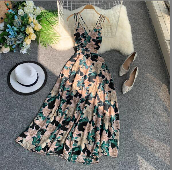 Women’s Belted Waist Dress with floral pattern displayed with hat and shoes on carpet