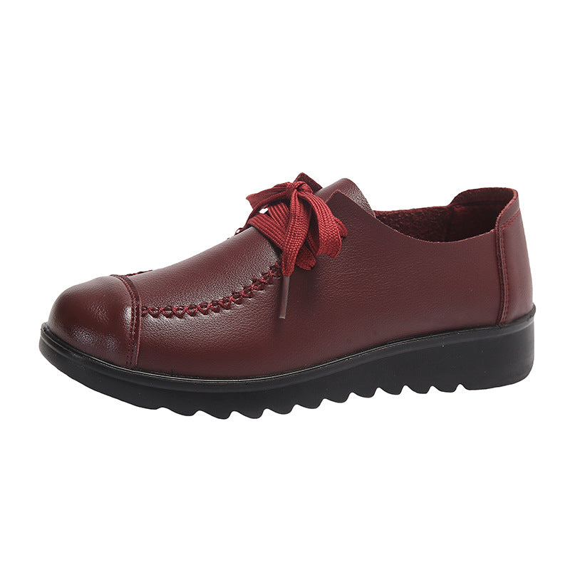 Women’s Black Flat Work Shoes – Soft Sole Anti-Slip Flats in maroon leather with a cushioned sole.