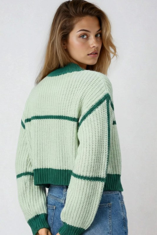Woman wearing a Two-Tone Color Block Cardigan in a relaxed fit with a striped pattern, perfect for versatile styling and comfort.