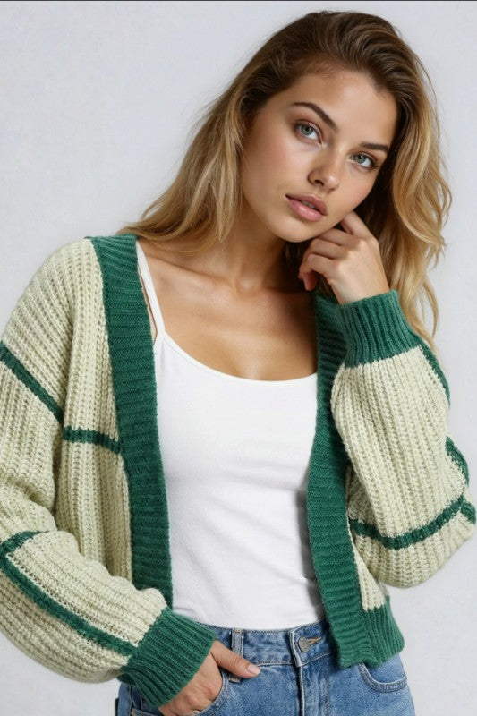 Woman wearing a knit Two-Tone Color Block Cardigan, featuring an open-front, striped pattern, and relaxed fit for comfortable, stylish layering.
