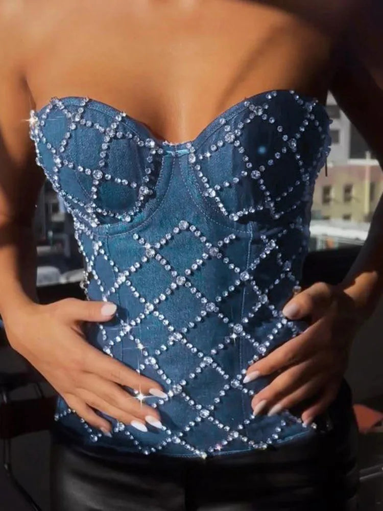 Rhinestone Cowgirl Denim Vest with sparkling rhinestones, highlighting body-conforming fit and Western elegance for bold style.