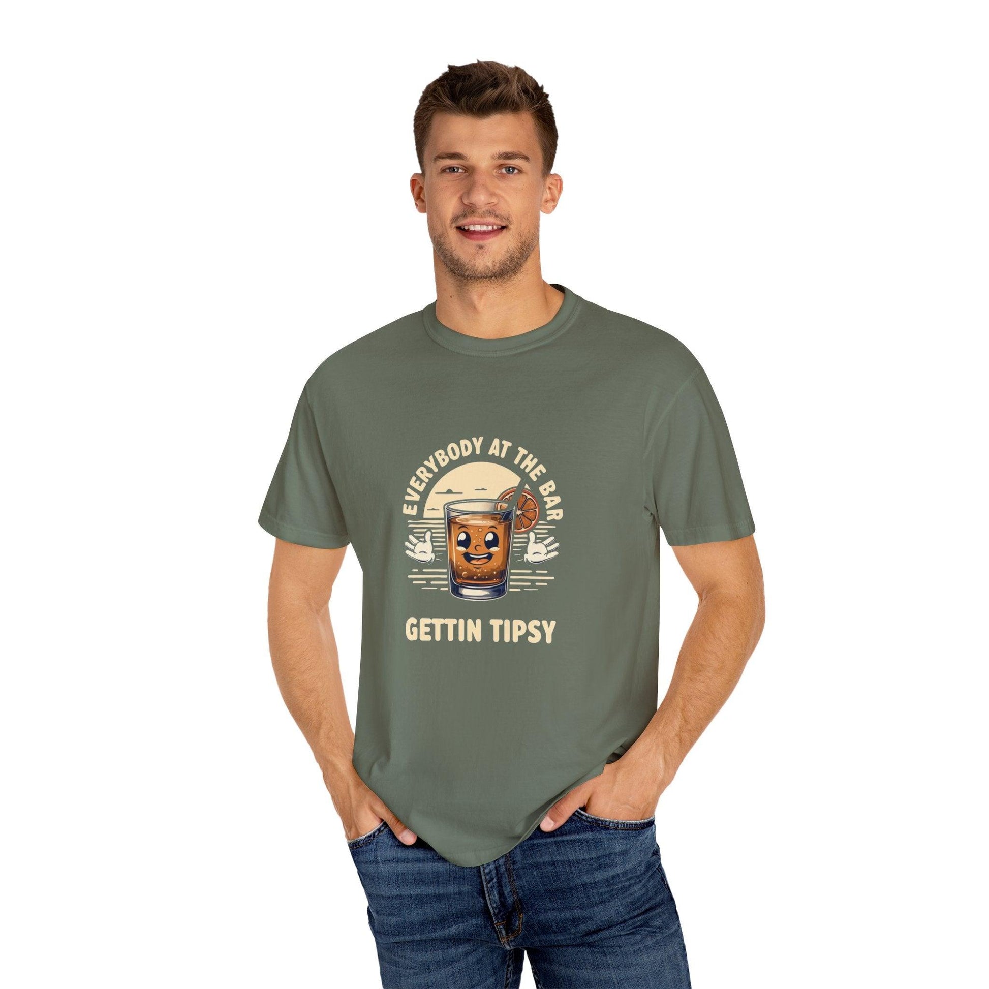 Man wearing Everybody at the Bar Gettin Tipsy Unisex Garment-Dyed T-Shirt with whiskey glass design