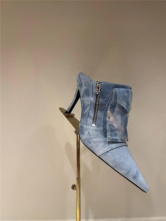 Women Pocket Denim Pointed Toe Heeled Ankle Boots on display, highlighting unique texture and modern design.