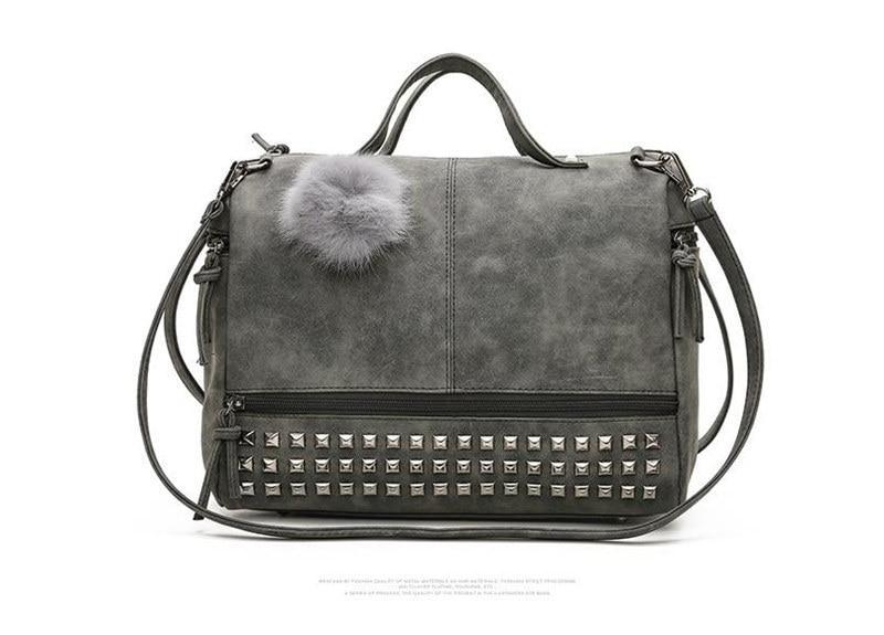 Rustic Charm Leather Shoulder Bag – Stylish Cowgirl Handbag with rivet details and soft structure.