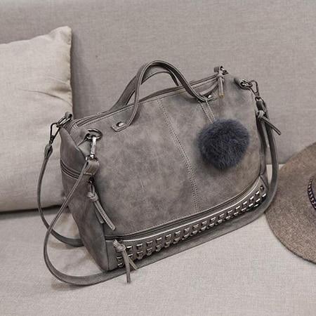 Rustic Charm Leather Shoulder Bag – Stylish Cowgirl Handbag with rivet details and soft structure, perfect for casual outings.