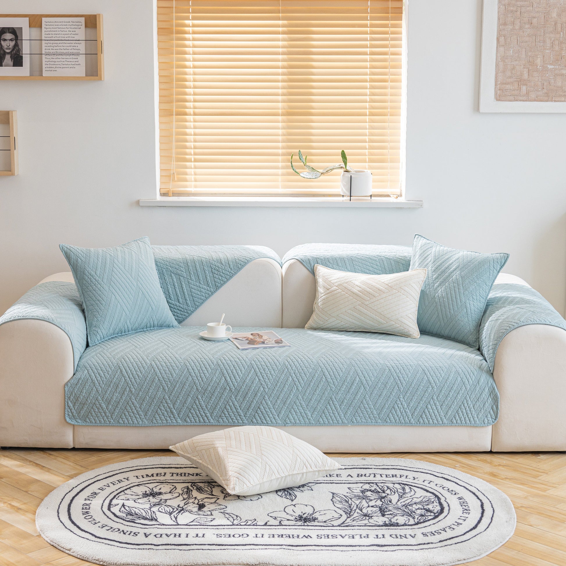 Quilted Geometric Cotton Sofa Cover, Non-Slip & Thick Padded Furniture Covers on a white sofa in a living room.
