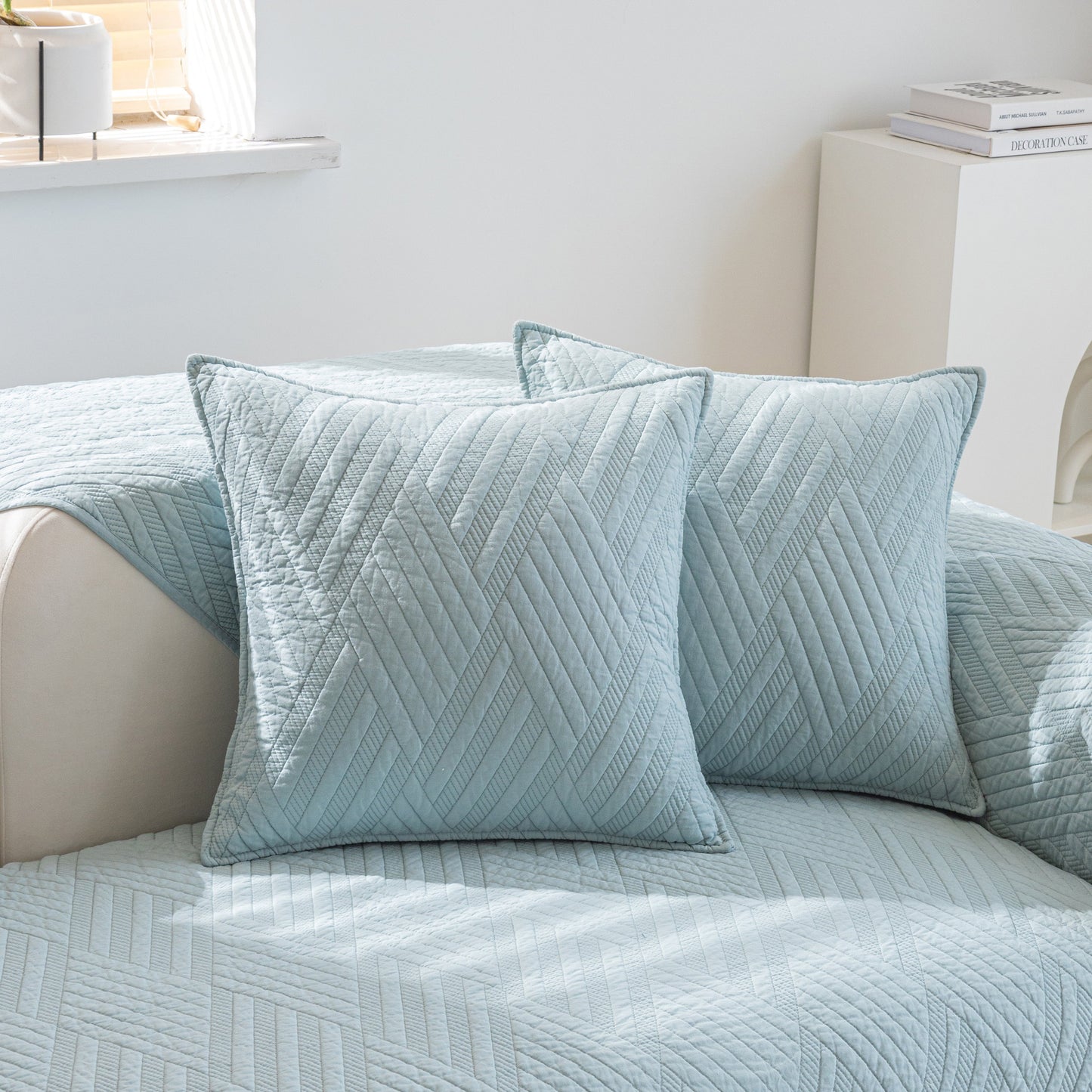 Quilted Geometric Cotton Sofa Cover, Non-Slip & Thick Padded Furniture Covers with diagonal stitching in a light blue color