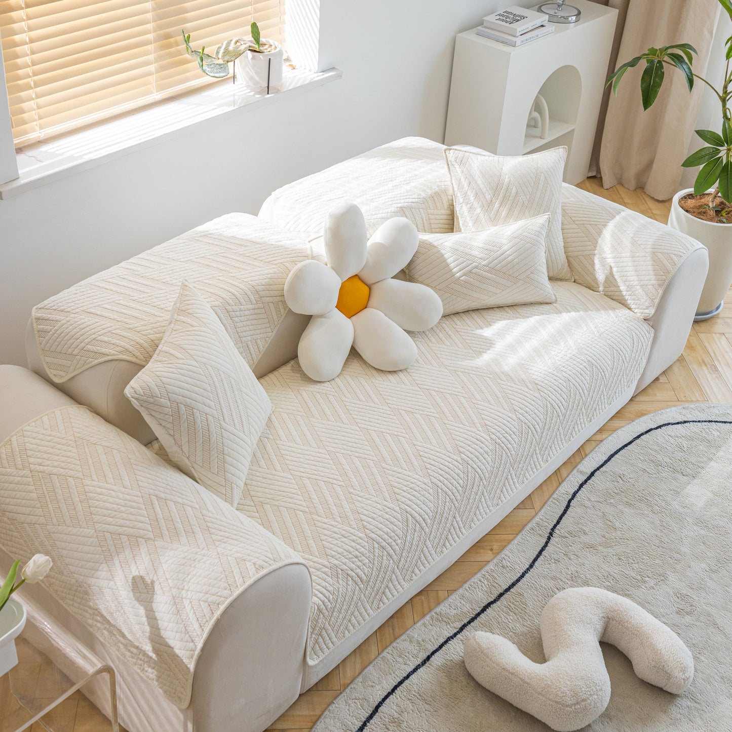 Quilted Geometric Cotton Sofa Cover, Non-Slip & Thick Padded Furniture Covers on white sofa with geometric pattern