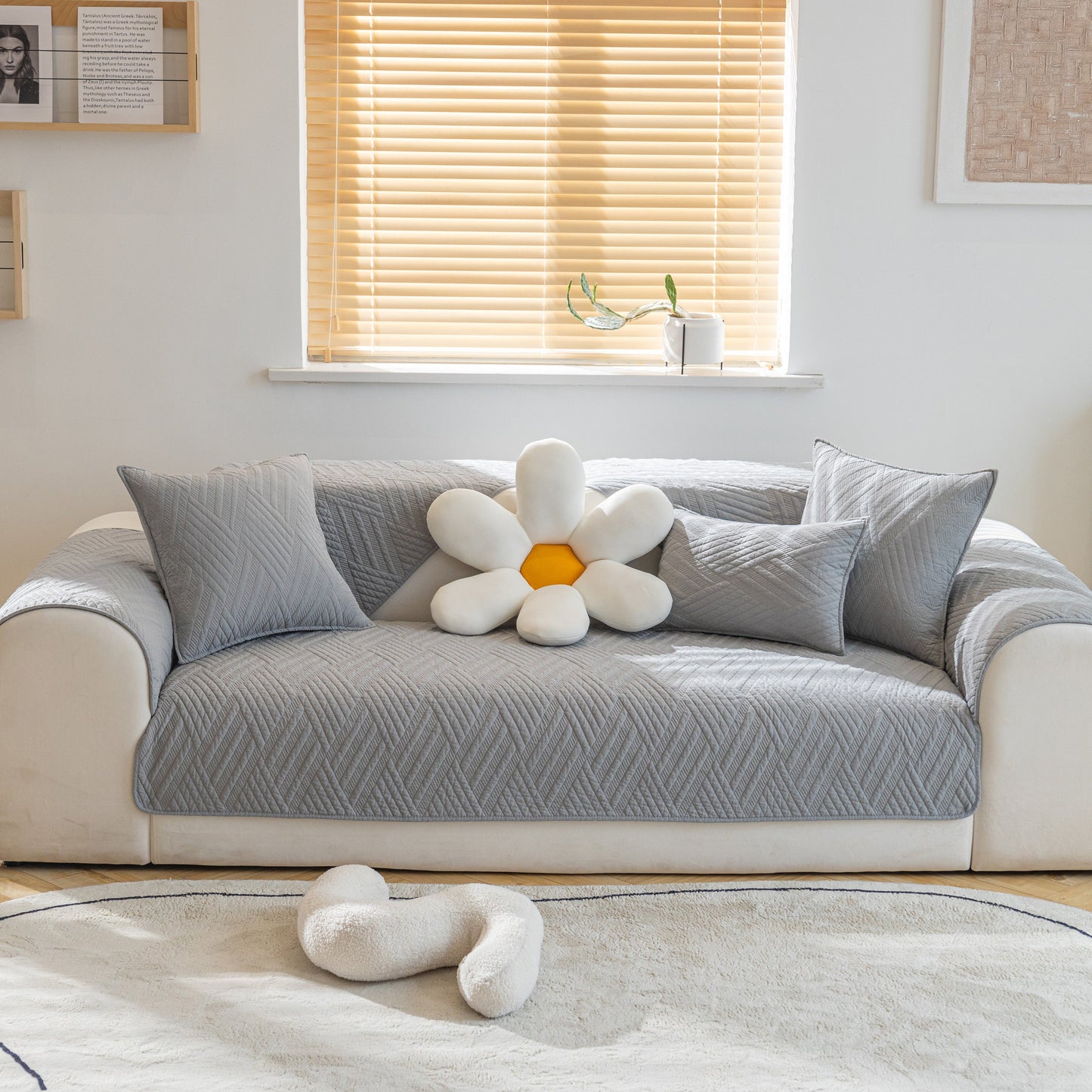 Quilted Geometric Cotton Sofa Cover, Non-Slip & Thick Padded Furniture Covers on a living room sofa with decorative pillows.