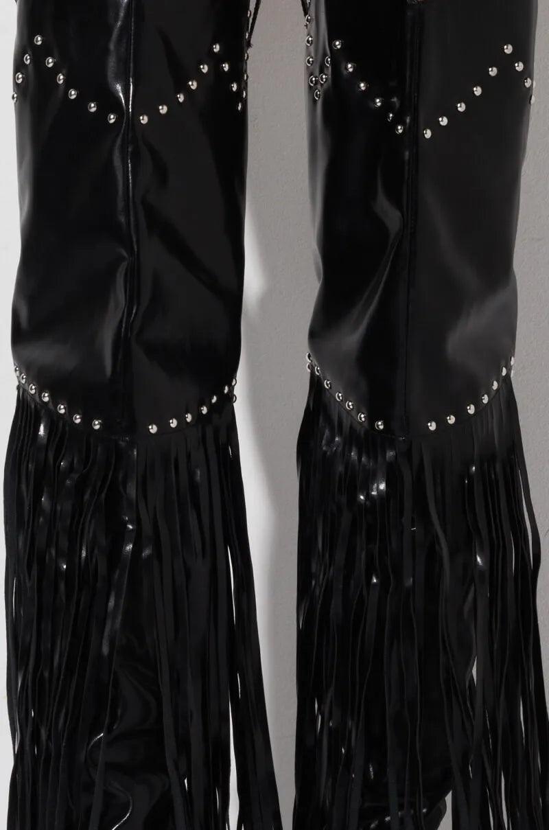Vintage Fringe Over-the-Knee Boots with black leather, silver studs, and fringe details.