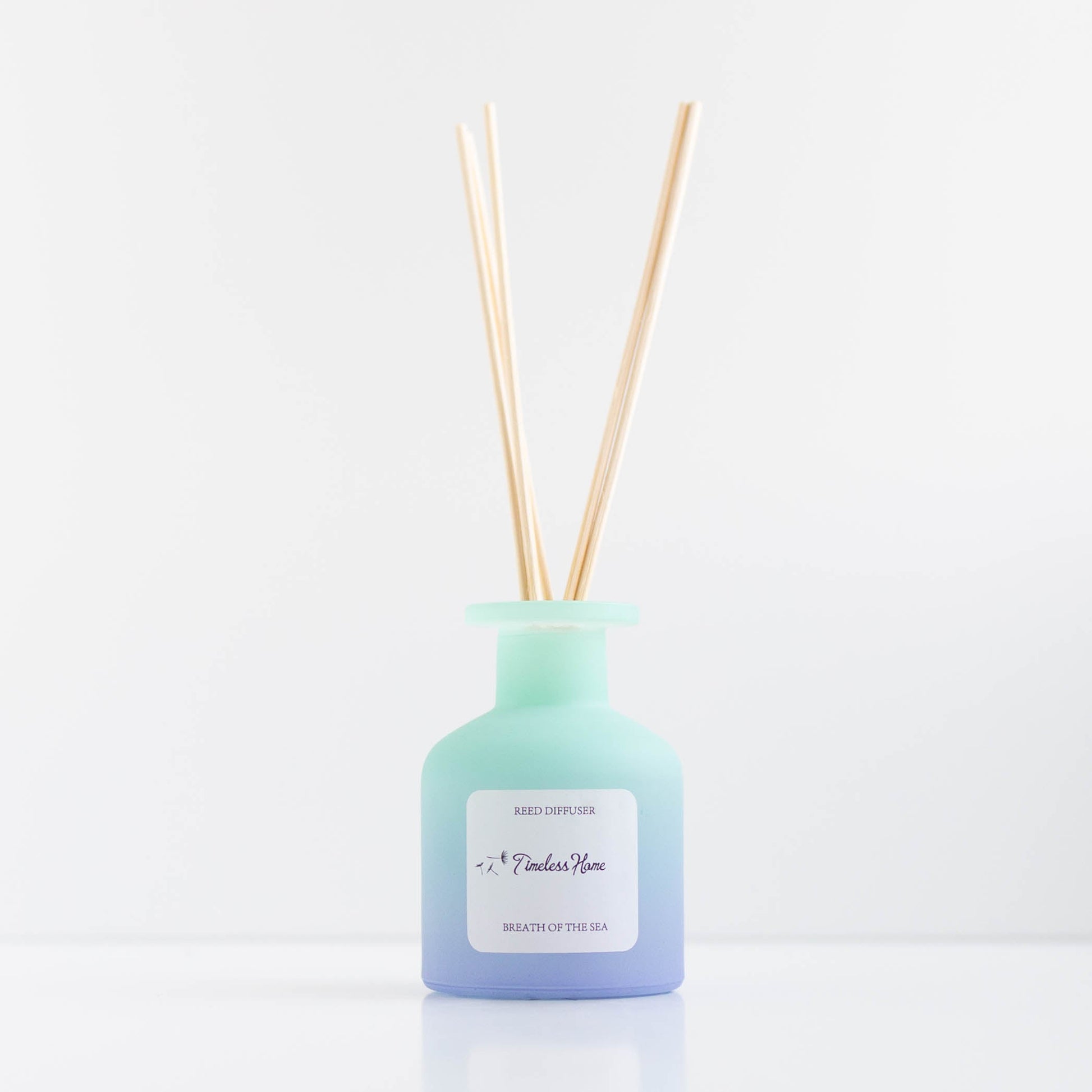 Reed Diffuser - Breathe of The Sea in frosted glass with natural reeds, luxurious and long-lasting fragrance, elegant home decor.