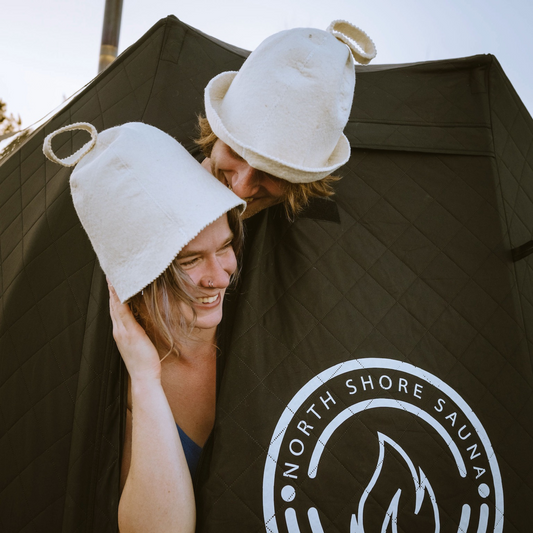 People wearing Wool Felt Sauna Hat enjoying a sauna session