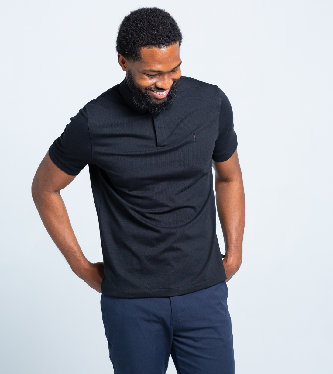 Short Sleeve Perfect Polo in black with StaySharp™ Collar, wrinkle-free fabric, and tailored comfort.