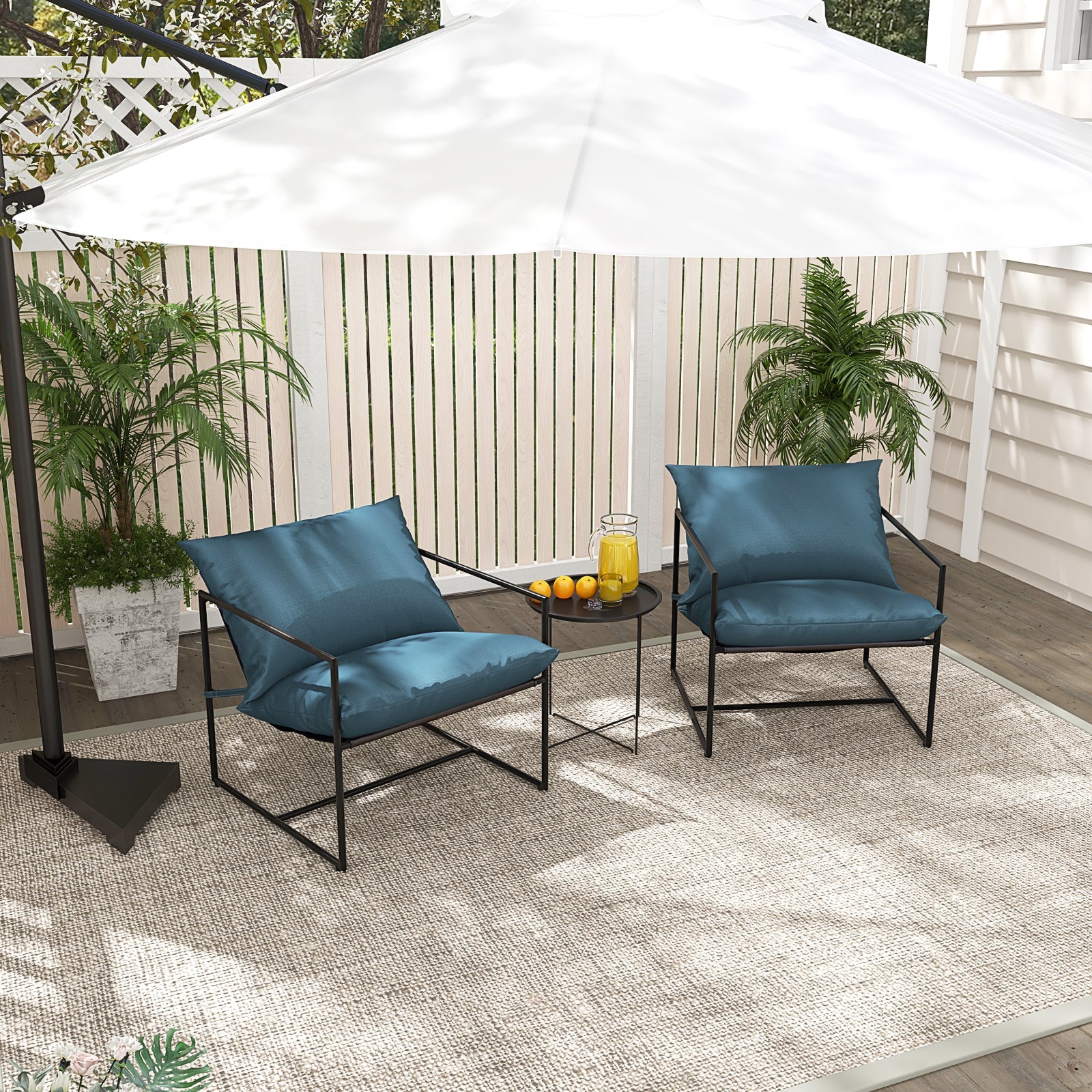 2 Pieces Sling Accent Chair Leisure Chair with Weatherproof Seat Fabric Indoor Outdoor-Navy by a patio table under an umbrella