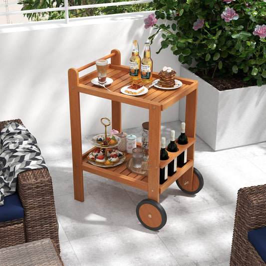 2 Tier Rolling Serving Cart with Wine Bottle Holders and 2 Rubber Wheels on a patio, displaying drinks and appetizers.