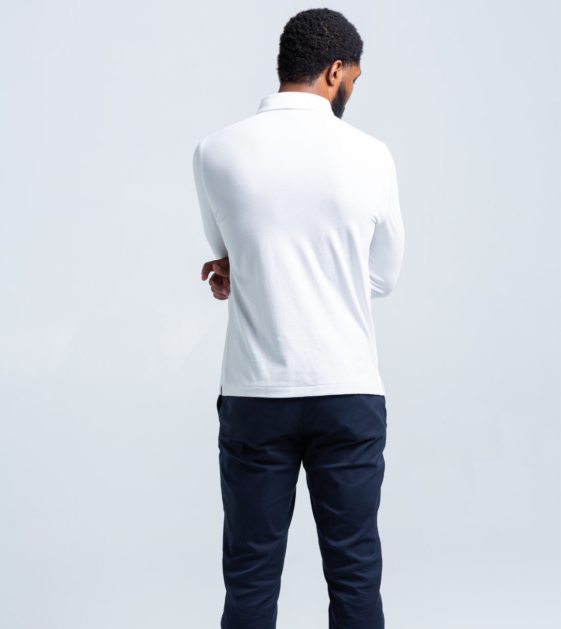 Back view of Long Sleeve Perfect Polo in white, featuring StaySharp™ Collar and four-way stretch, tailored fit for cooler days.