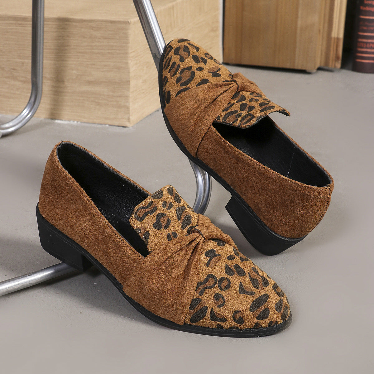 Women’s Leopard Print Pumps with bow detail for a bold fashion statement