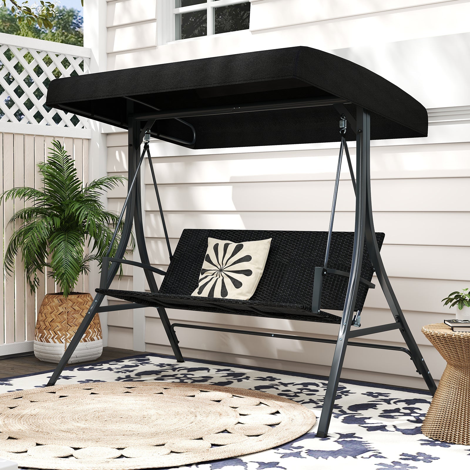 3-Person Porch Swing with Stand Outdoor Canopy Swing with Rattan Seat Back-Black on patio
