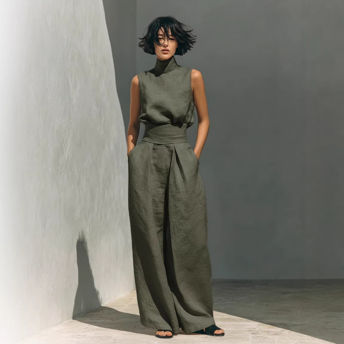 Model wearing Women’s Cotton Linen Two-Piece Set – Sleeveless Top & Wide-Leg Pants, showcasing casual elegance in breathable fabric.