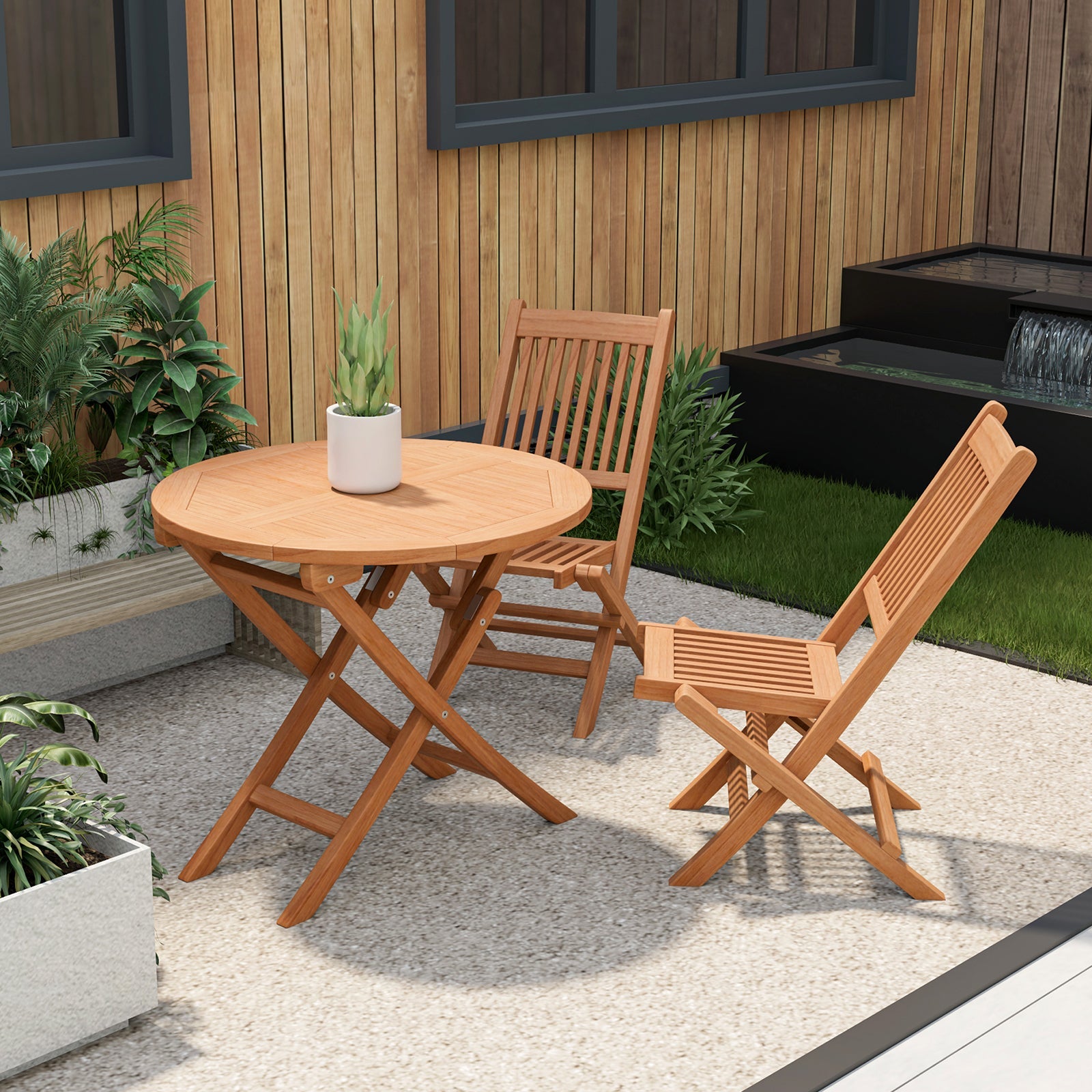 31.5 Inch Folding Patio Indonesia Teak Wood Round Coffee Table set in outdoor patio scene with chairs