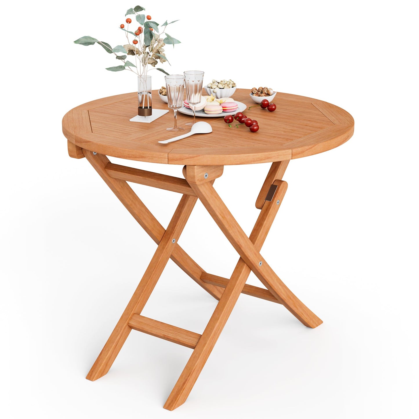 31.5 Inch Folding Patio Indonesia Teak Wood Round Coffee Table with decorations on top, perfect for backyard or balcony use