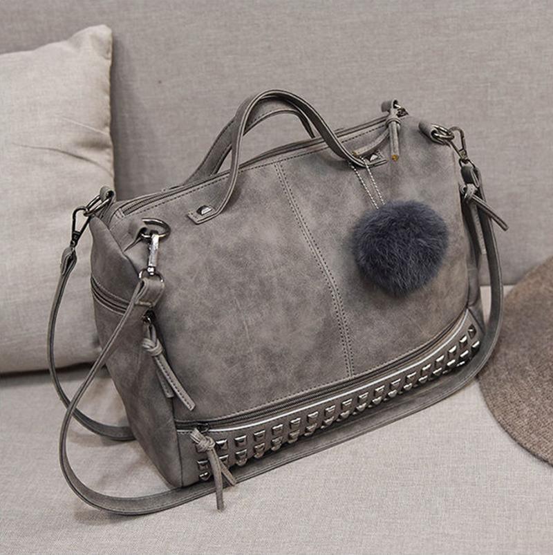 Rustic Charm Leather Shoulder Bag – Stylish Cowgirl Handbag with rivet details and soft structure, perfect for everyday use.