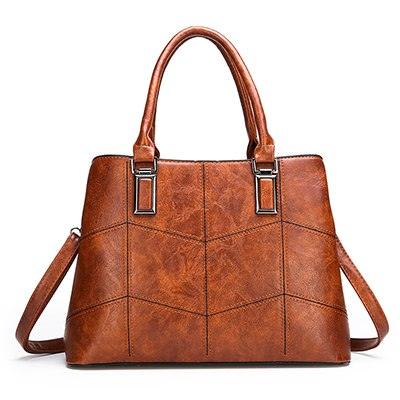 Luxury 3 Piece Leather Tote Set | Genuine Leather Cowgirl Shoulder Bag & Clutch in brown with contemporary design.