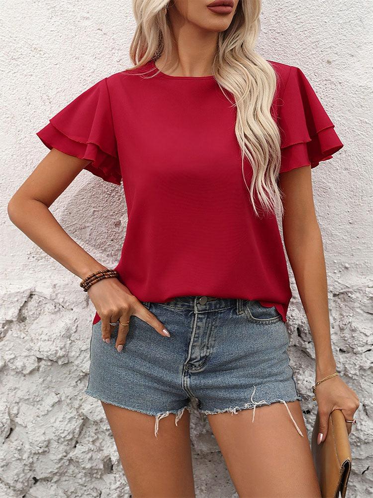 Woman wearing Lotus Blossom Ruffle Top - Stylish Red Double-layer Lotus Leaf Sleeve Blouse with shorts