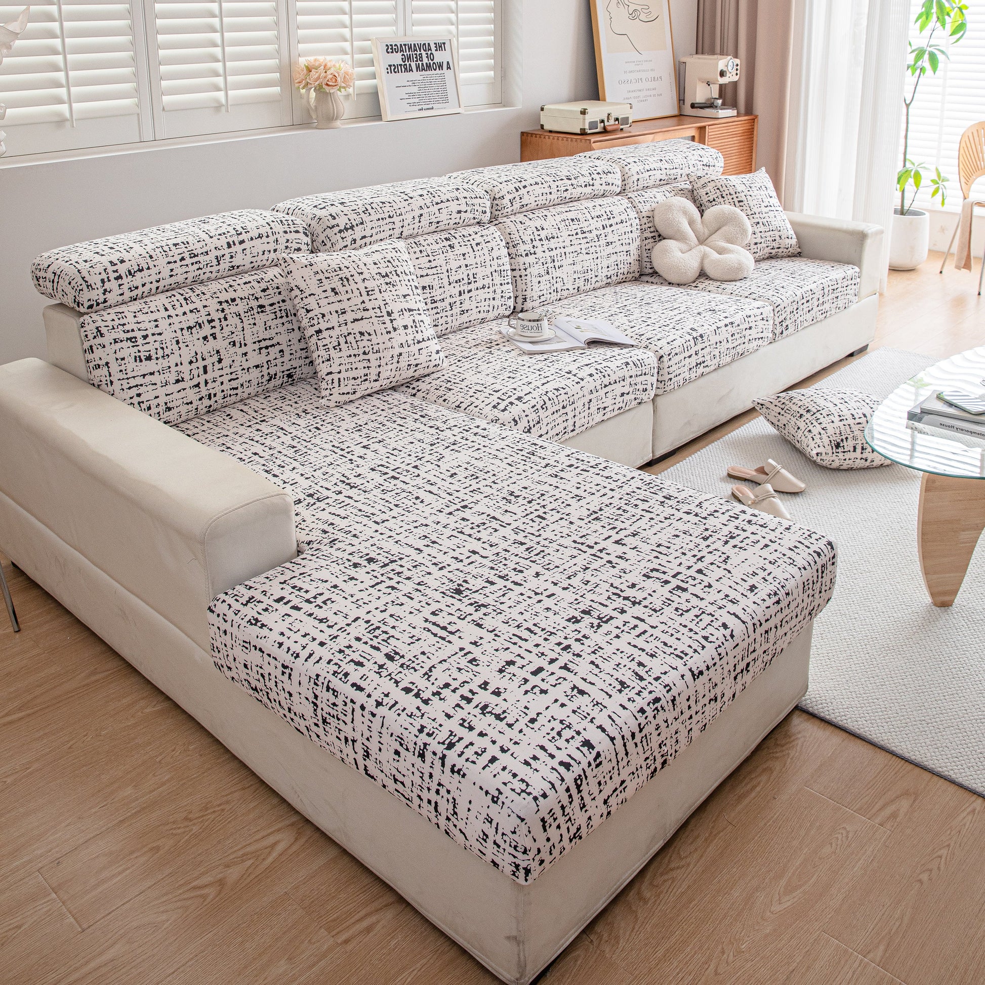 Stretch Individual Cushion Slipcovers, Furniture Protector with Elastic Bottom covering a modern sofa in a stylish living room.