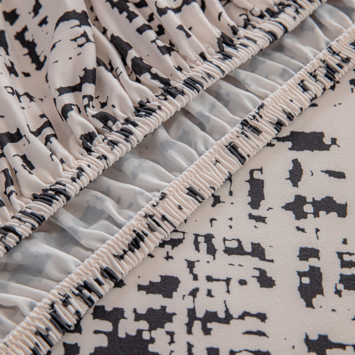 Close-up of Stretch Individual Cushion Slipcovers with elastic bottom, featuring high-quality polyester-spandex fabric design.