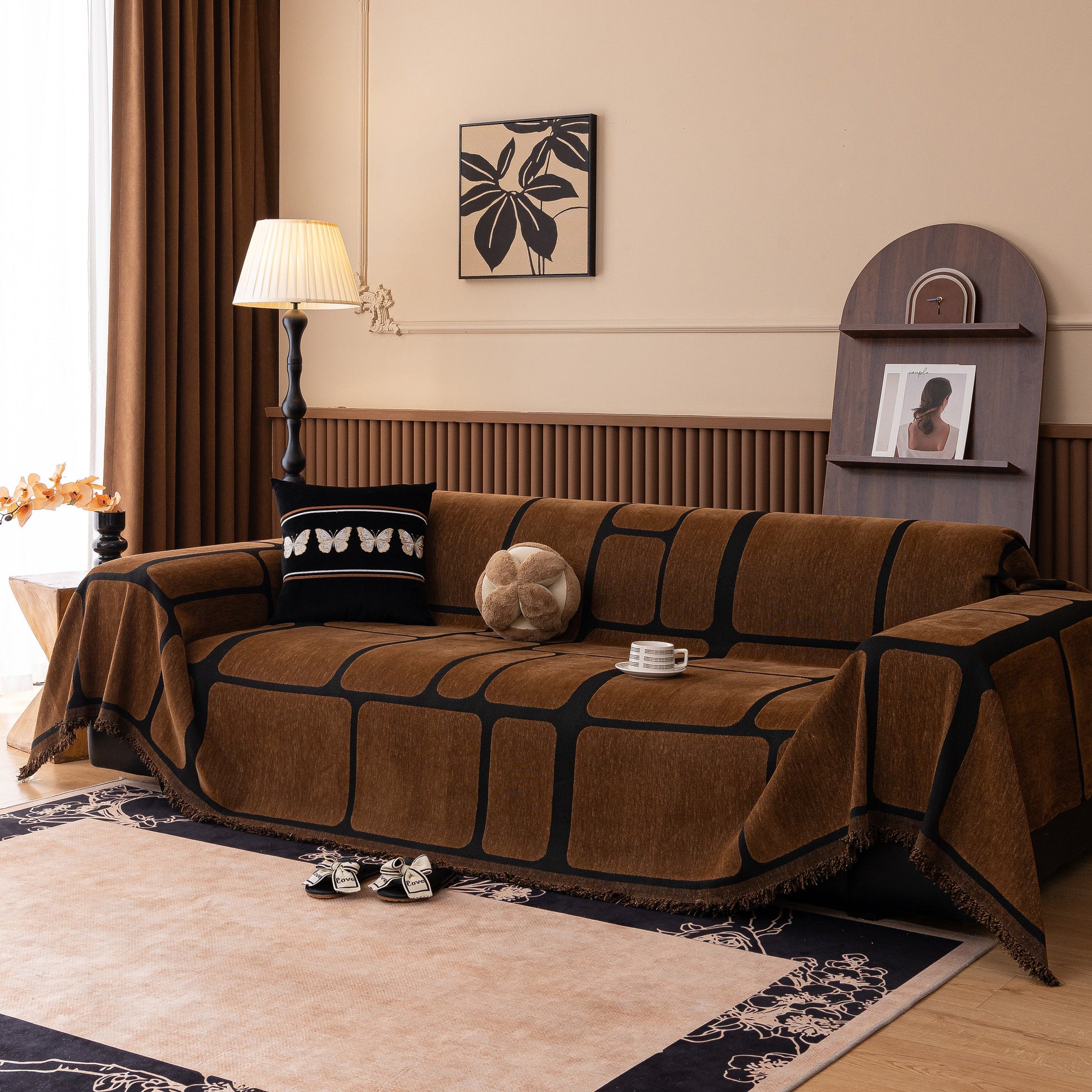 Living room with Modern Geometric Sofa Cover Decorative Couch Throw Blanket Furniture Protector on a sofa.