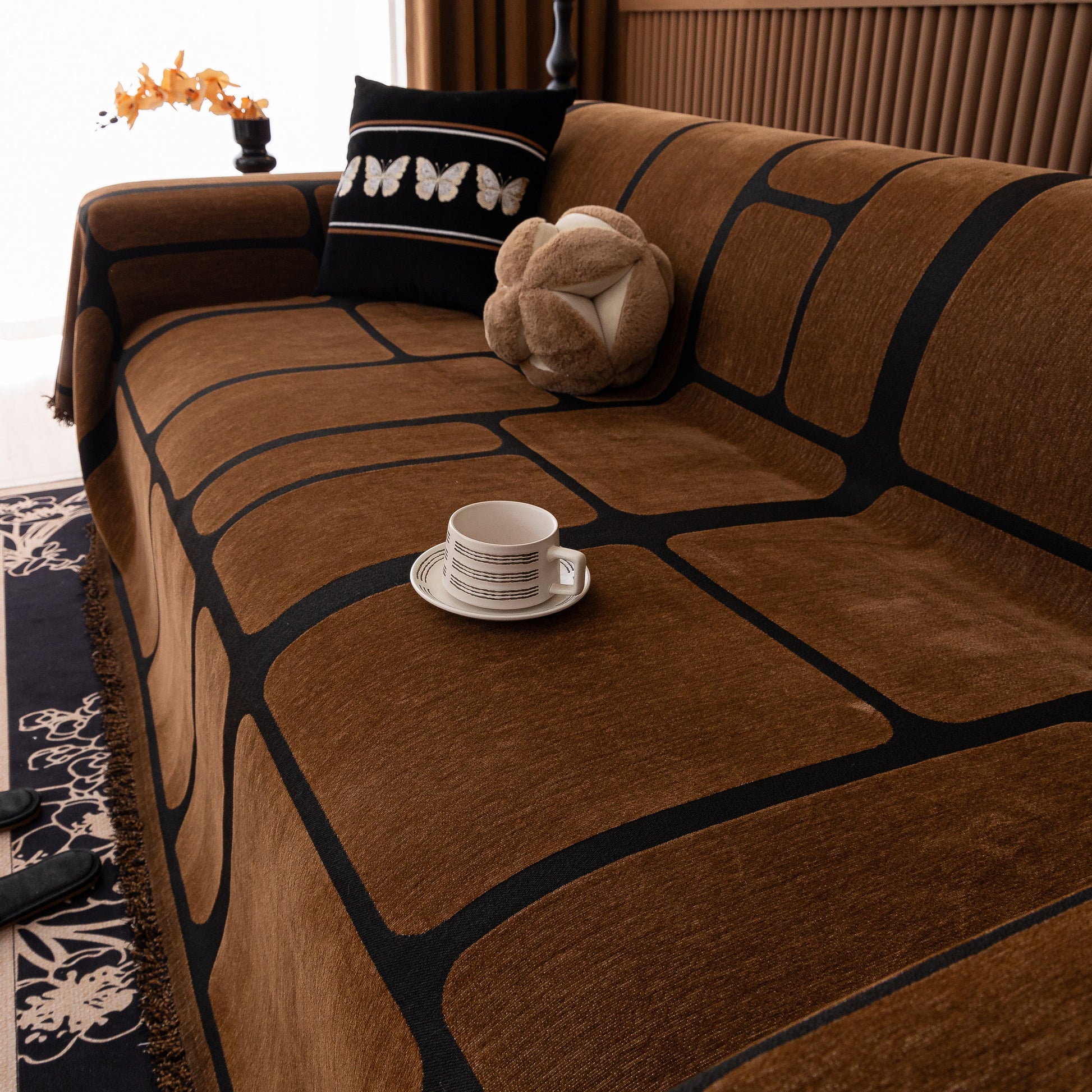 Modern Geometric Sofa Cover Decorative Couch Throw Blanket Furniture Protector in chenille with geometric pattern and tassels.