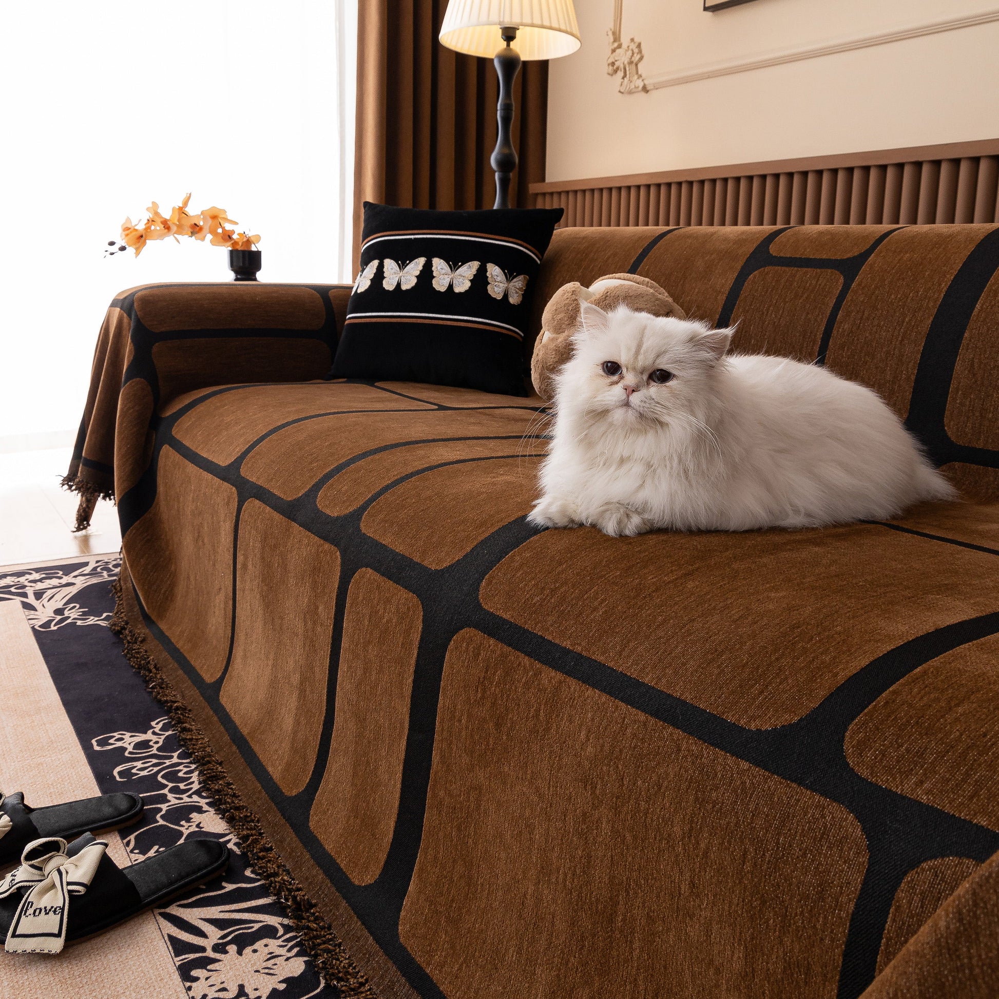 Modern Geometric Sofa Cover Decorative Couch Throw Blanket Furniture Protector with a geometric pattern in a stylish living room.