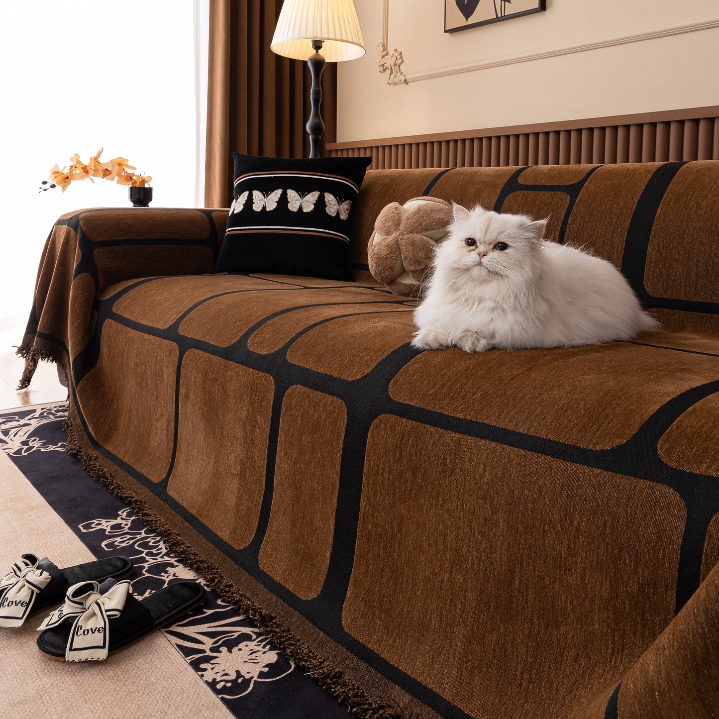 Modern Geometric Sofa Cover Decorative Couch Throw Blanket Furniture Protector with brown geometric pattern and tassels.
