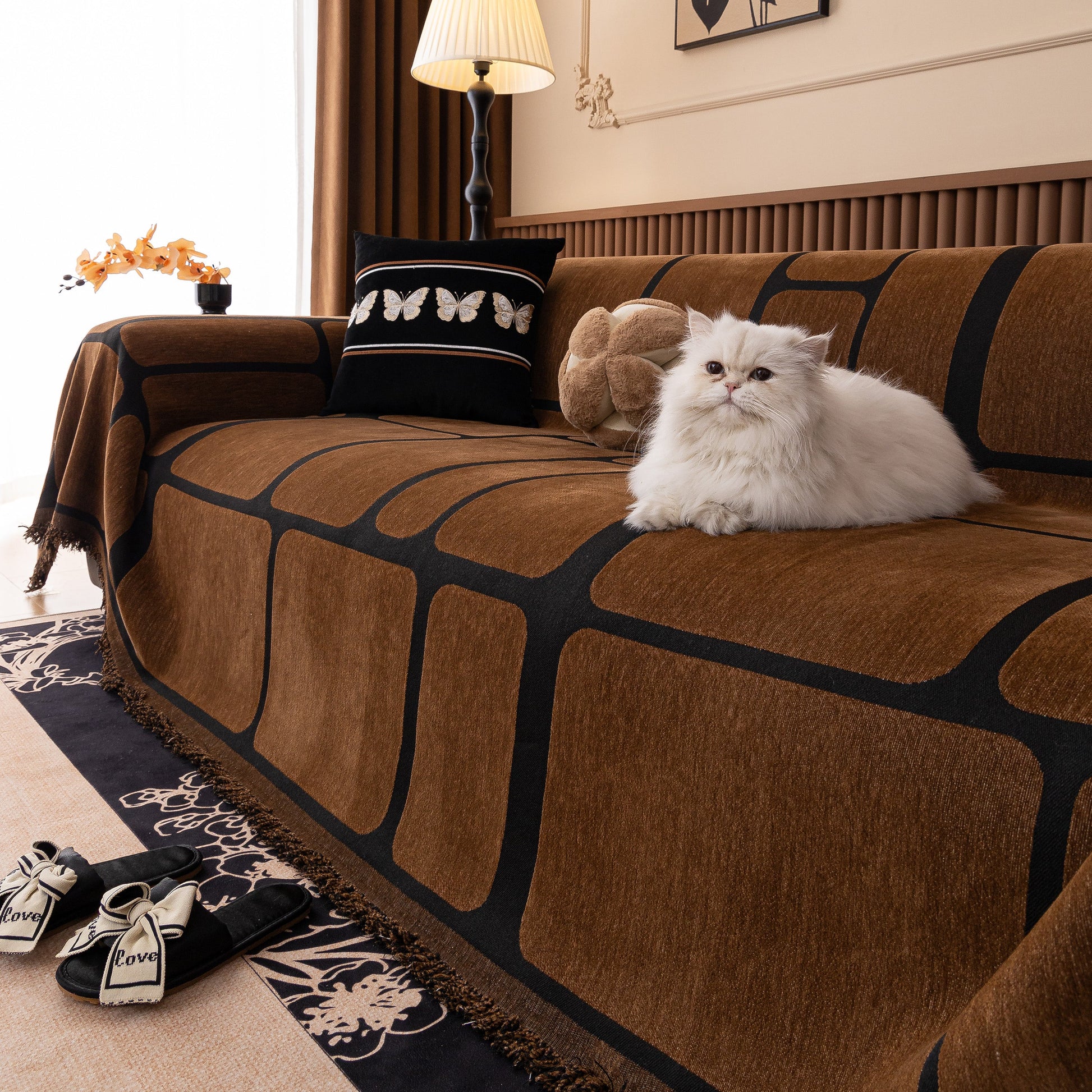 Modern Geometric Sofa Cover Decorative Couch Throw Blanket Furniture Protector with brown geometric pattern and tassels.