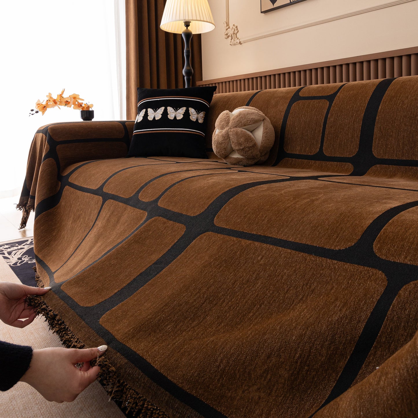 Modern Geometric Sofa Cover Decorative Couch Throw Blanket Furniture Protector in brown chenille with tassel edges on sofa