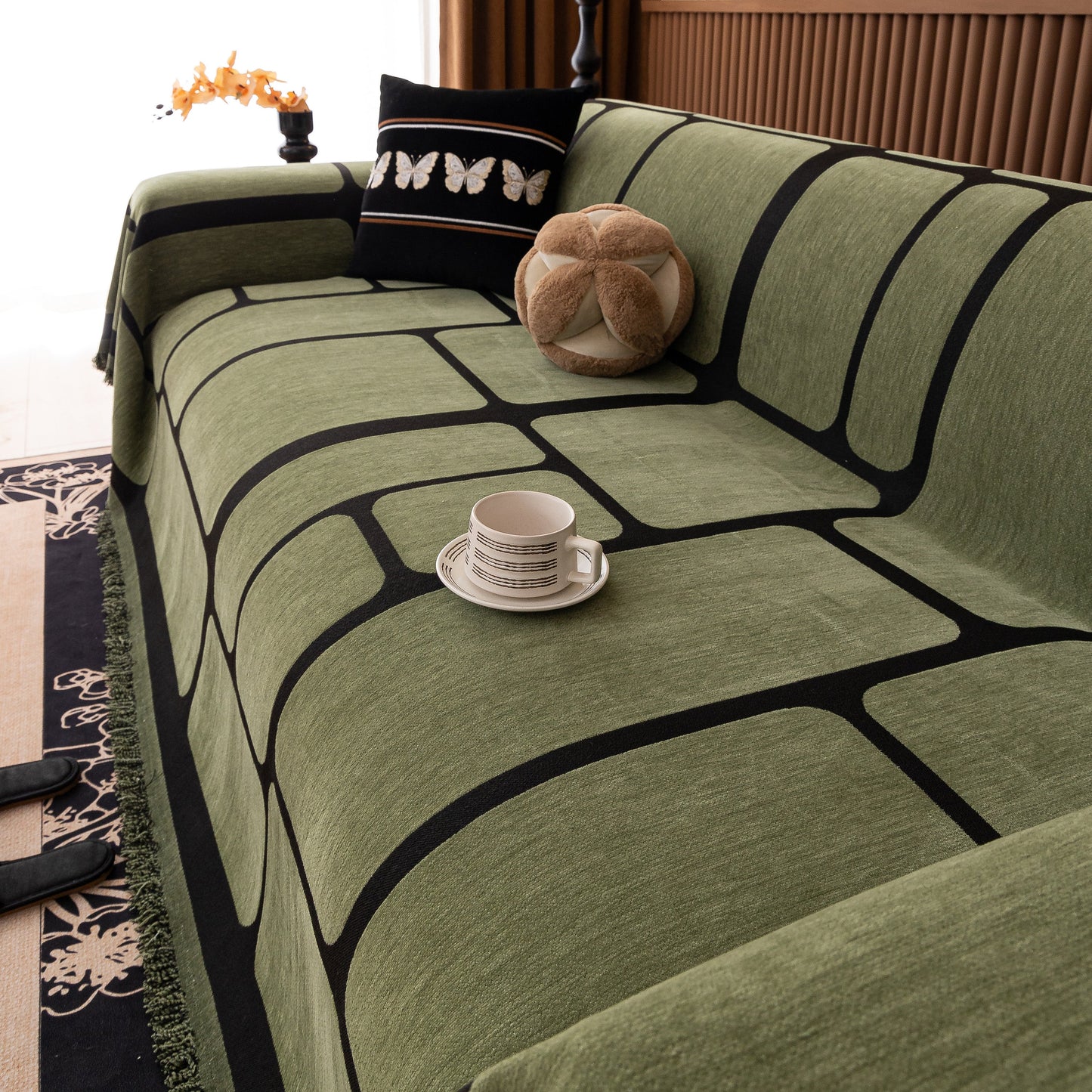 Modern Geometric Sofa Cover Decorative Couch Throw Blanket Furniture Protector in green with tassel edges - living room setting