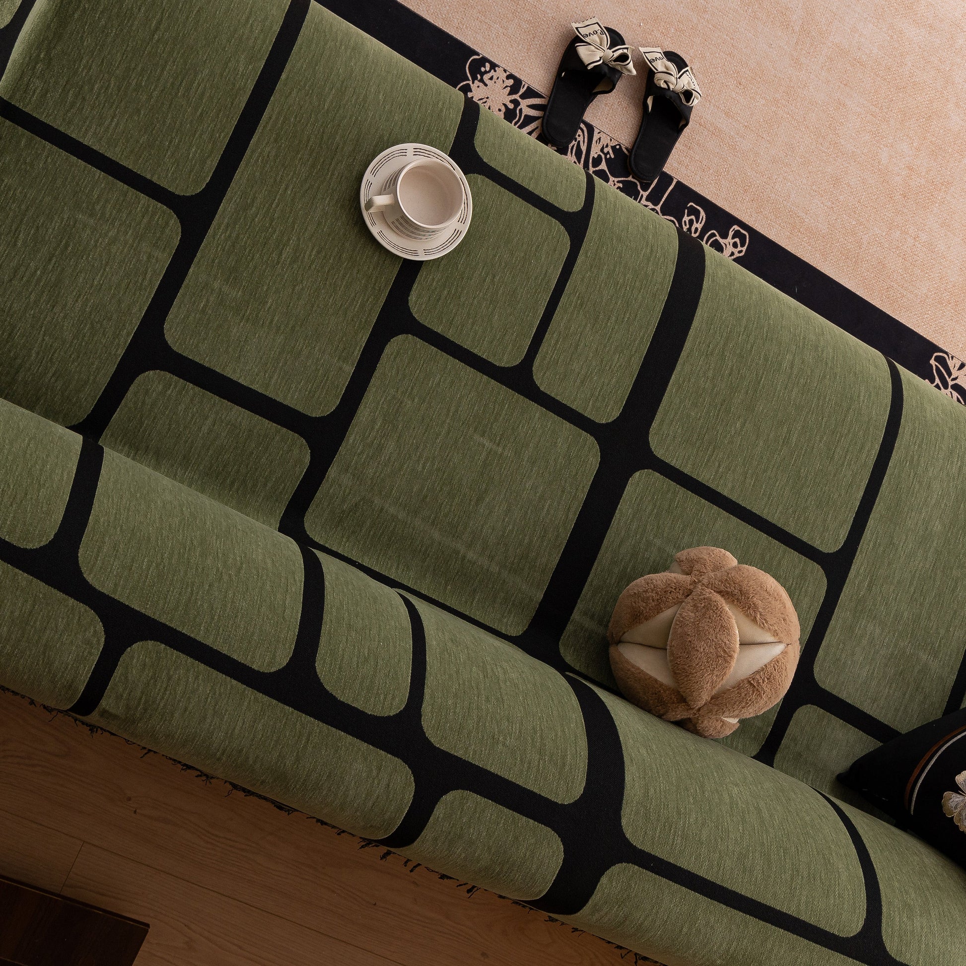 Modern Geometric Sofa Cover Decorative Couch Throw Blanket Furniture Protector in green with black geometric pattern.