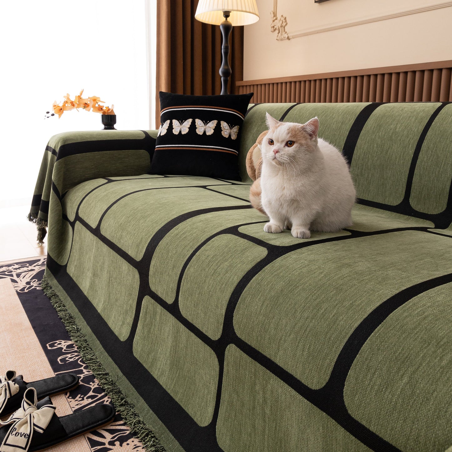 Modern Geometric Sofa Cover Decorative Couch Throw Blanket Furniture Protector with tassel edges and geometric pattern.