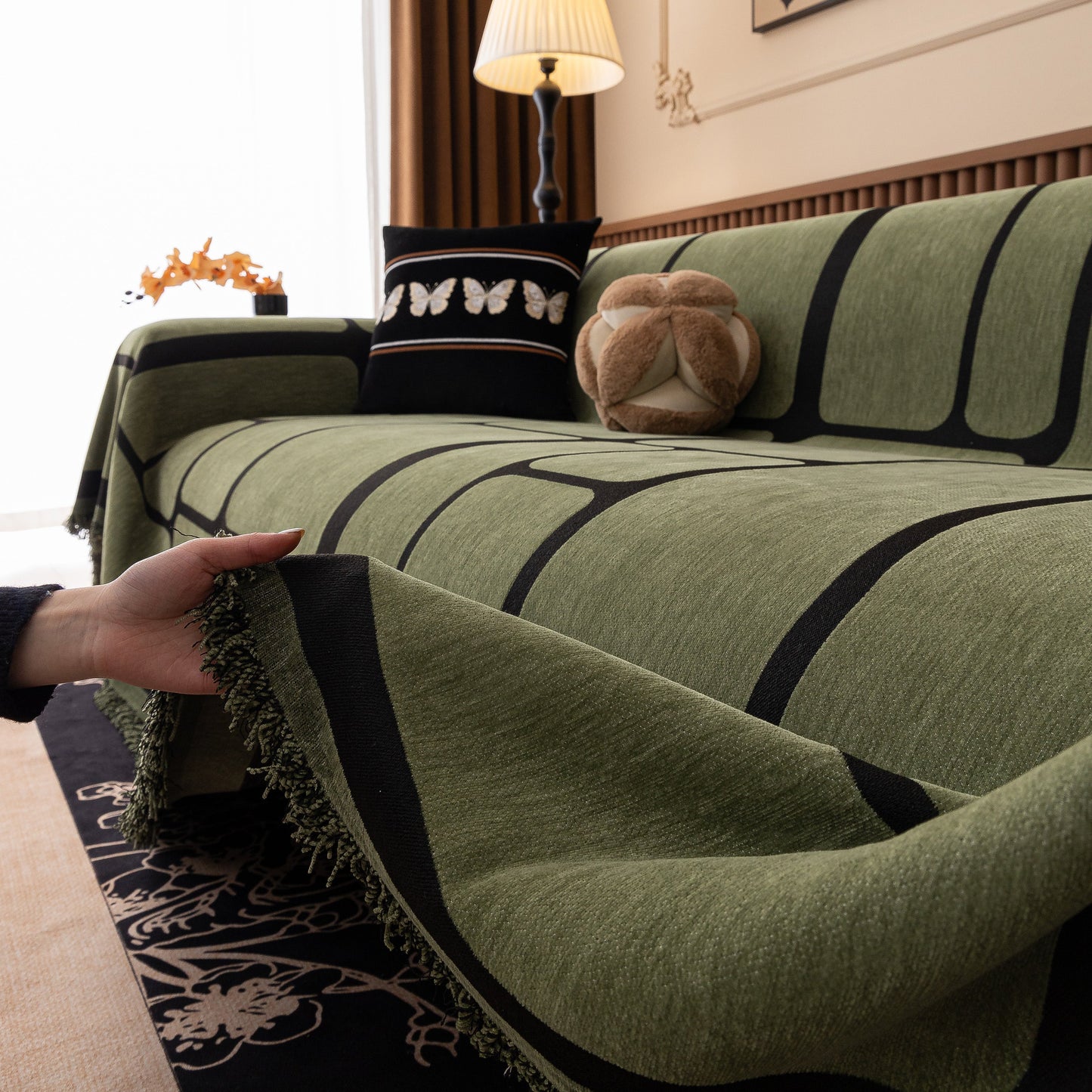 Modern Geometric Sofa Cover Decorative Couch Throw Blanket Furniture Protector with tassel edges and geometric pattern.
