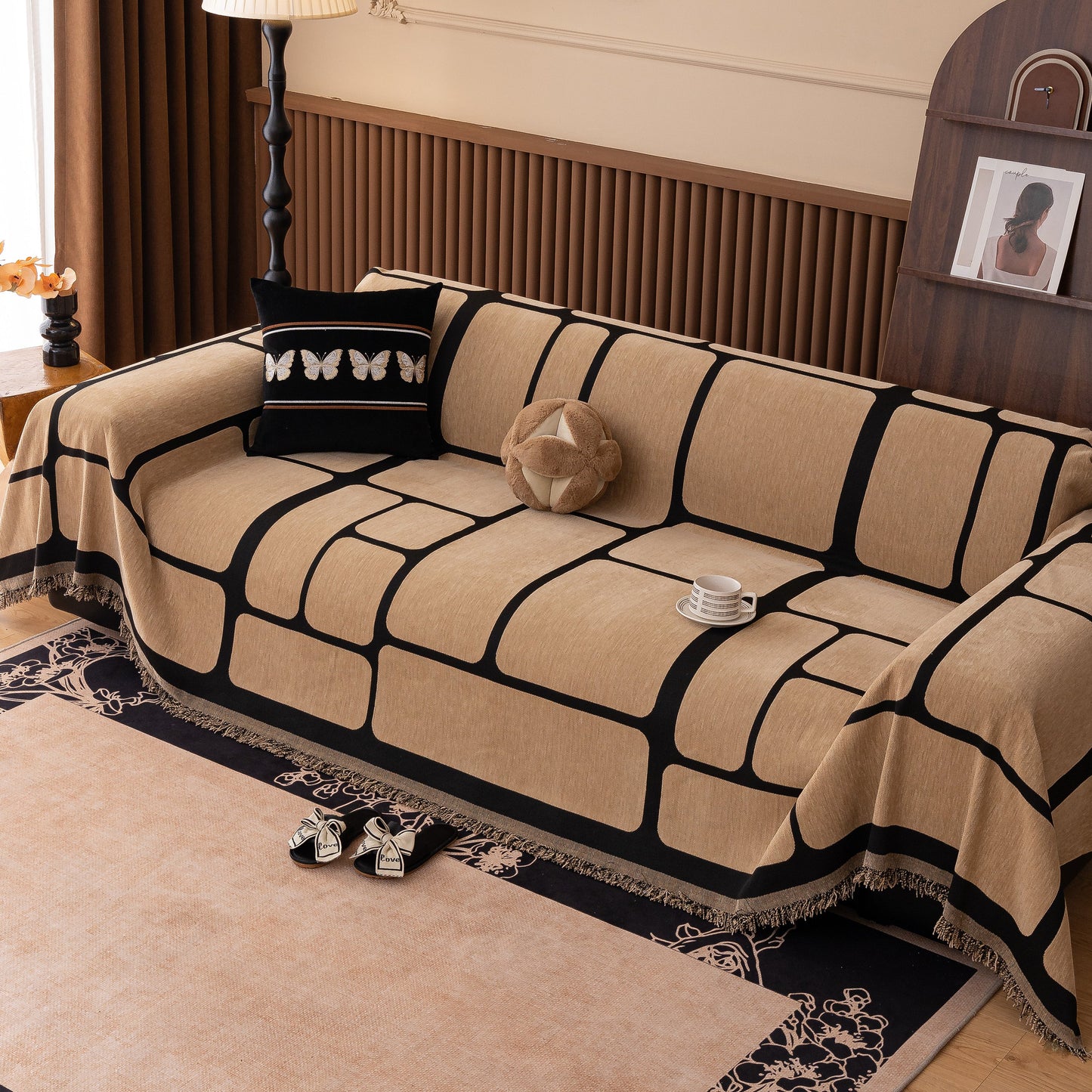 Modern Geometric Sofa Cover Decorative Couch Throw Blanket Furniture Protector in a stylish living room setting with tasseled edges