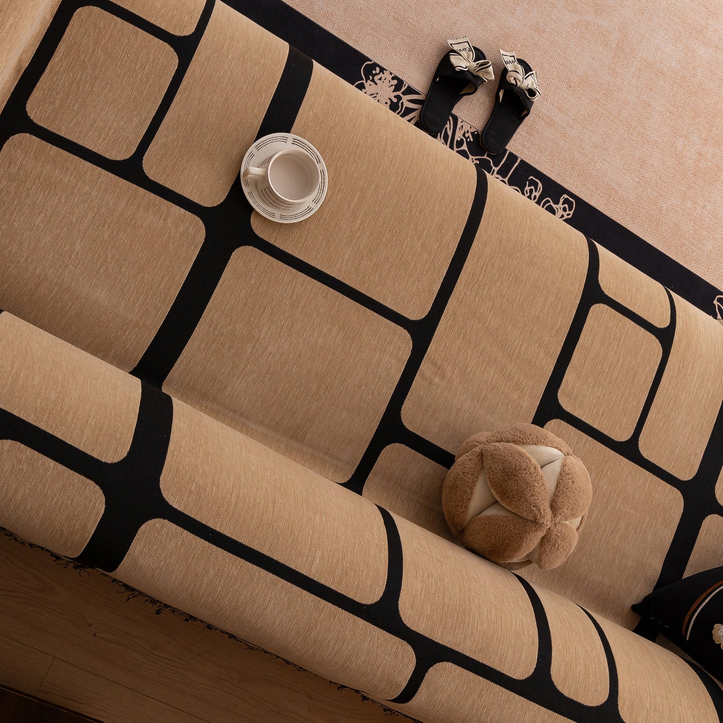 Modern Geometric Sofa Cover Decorative Couch Throw Blanket Furniture Protector with tasseled edges on a sofa.