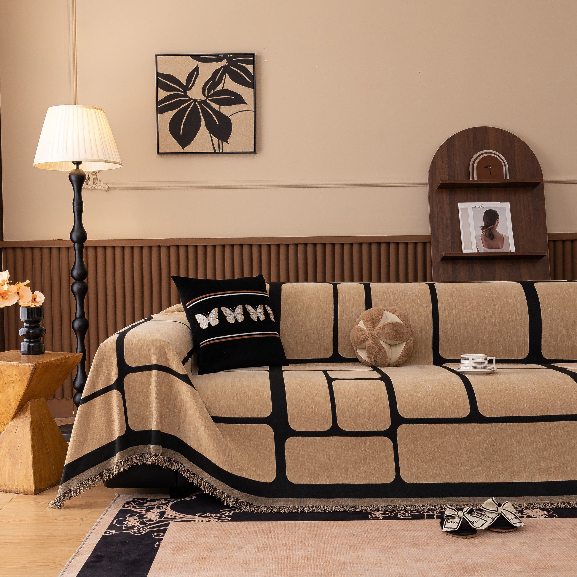 Modern Geometric Sofa Cover Decorative Couch Throw Blanket Furniture Protector on a beige sofa in a cozy living room.
