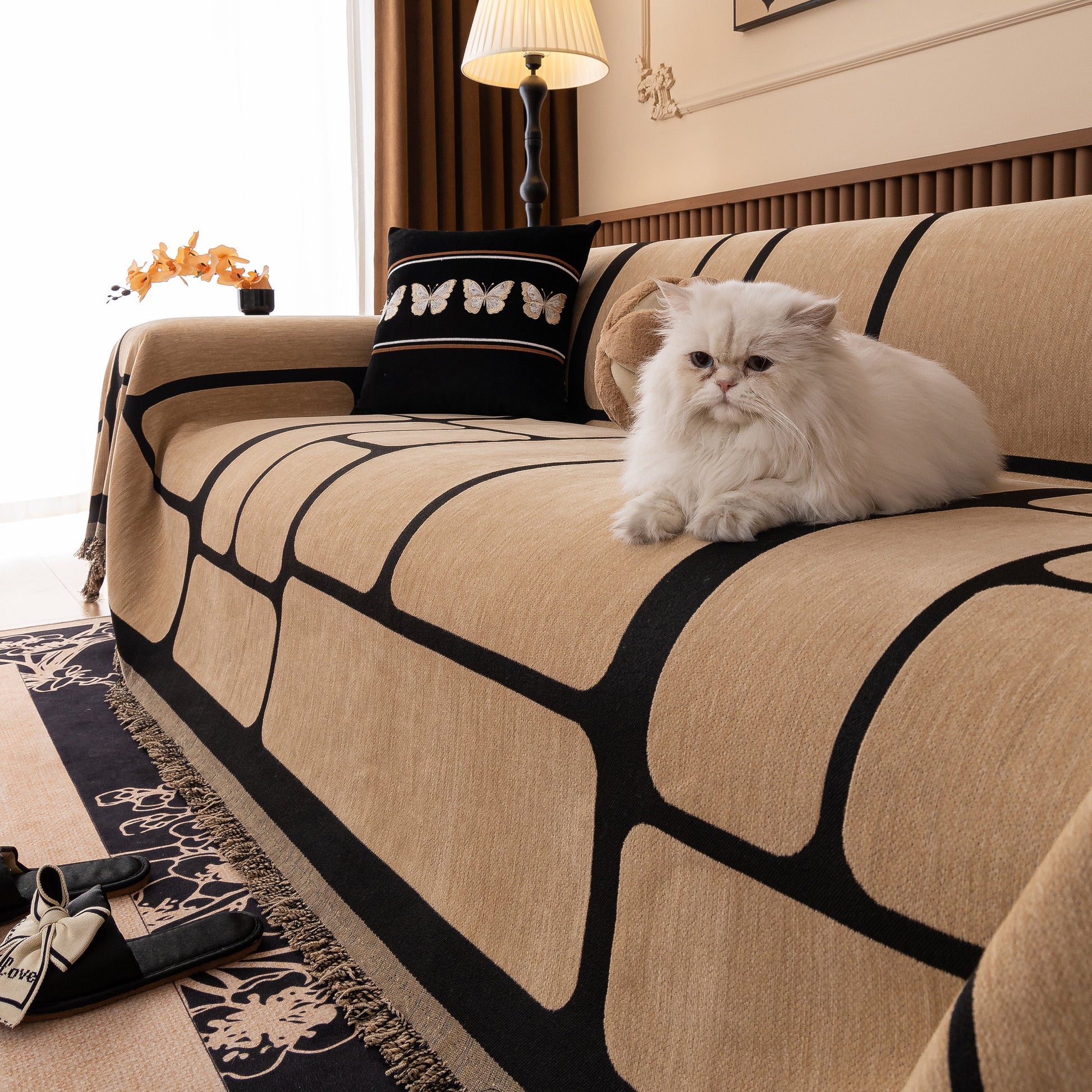 Modern Geometric Sofa Cover Decorative Couch Throw Blanket Furniture Protector on a couch with a white cat.