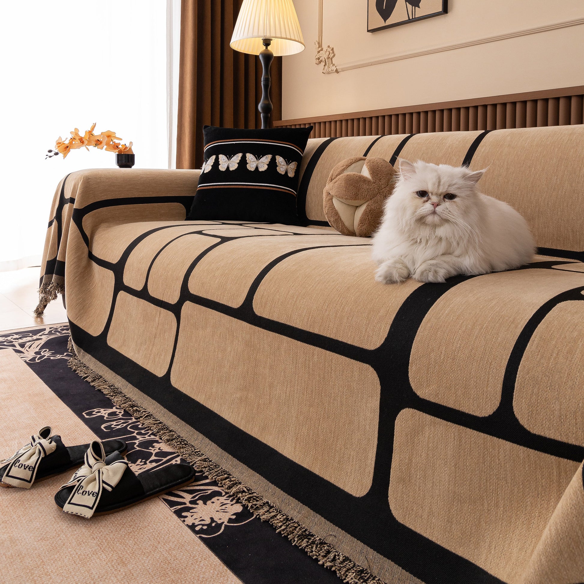 Modern Geometric Sofa Cover Decorative Couch Throw Blanket Furniture Protector in living room with cat sitting on it.