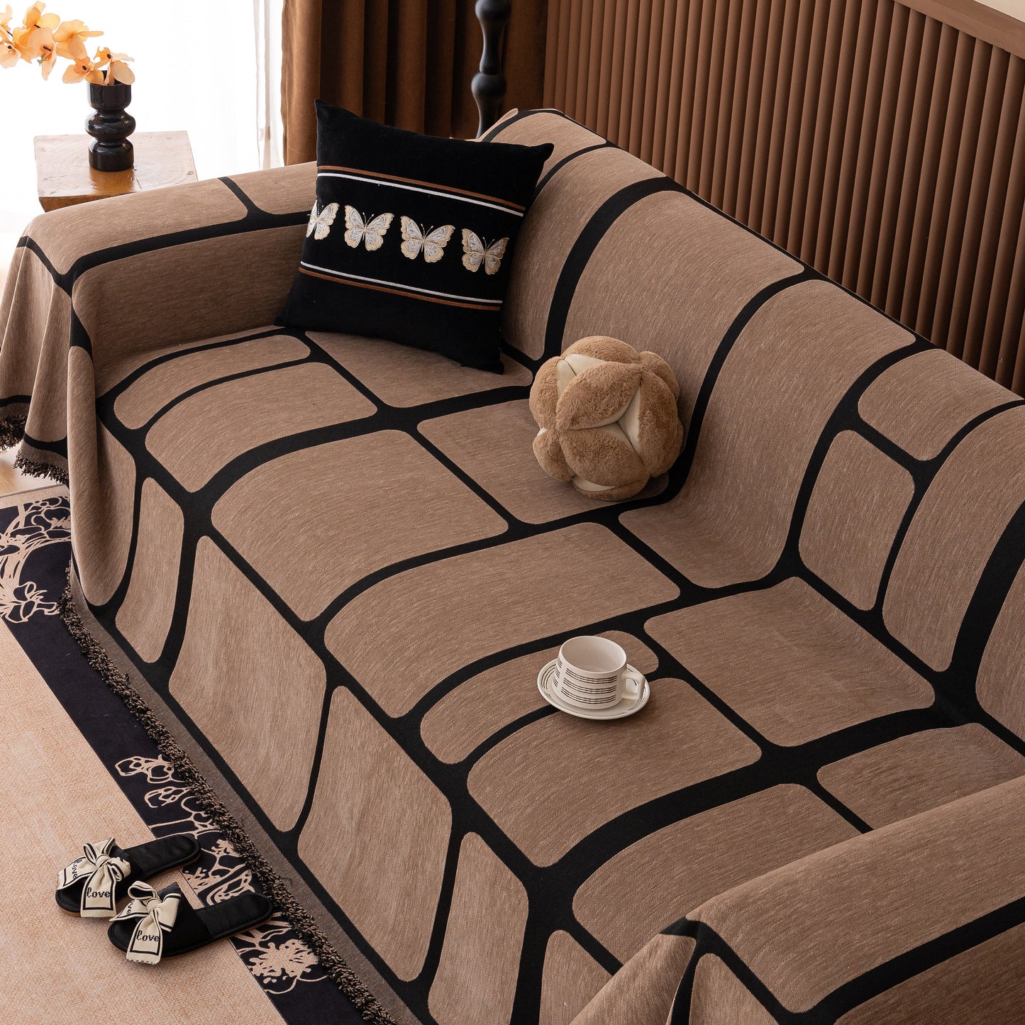 Modern Geometric Sofa Cover Decorative Couch Throw Blanket Furniture Protector with brown and black geometric design.