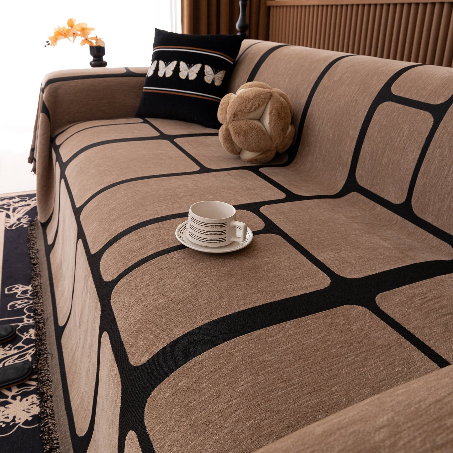 Modern Geometric Sofa Cover Decorative Couch Throw Blanket Furniture Protector in chenille fabric with geometric pattern and tassels.