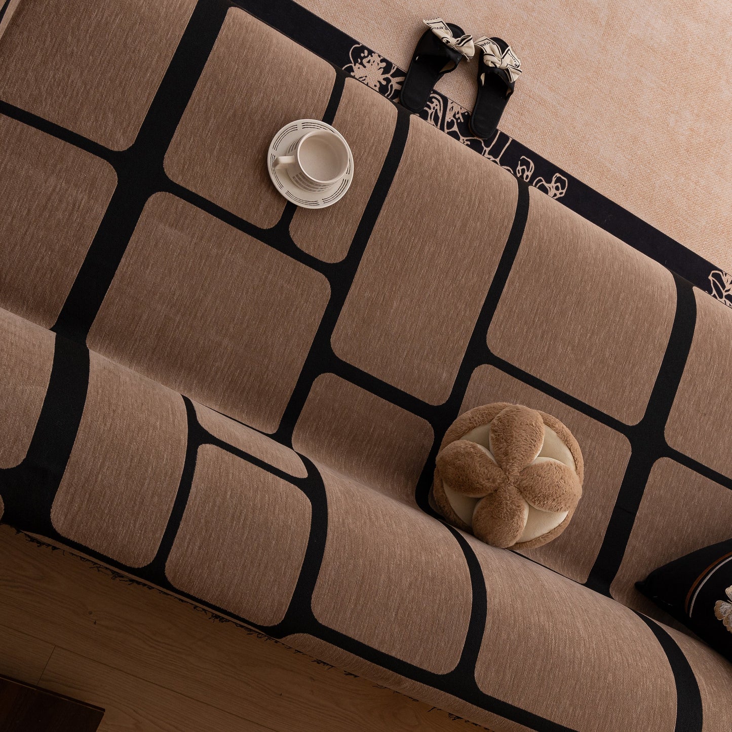 Modern Geometric Sofa Cover Decorative Couch Throw Blanket Furniture Protector with brown and black geometric pattern.