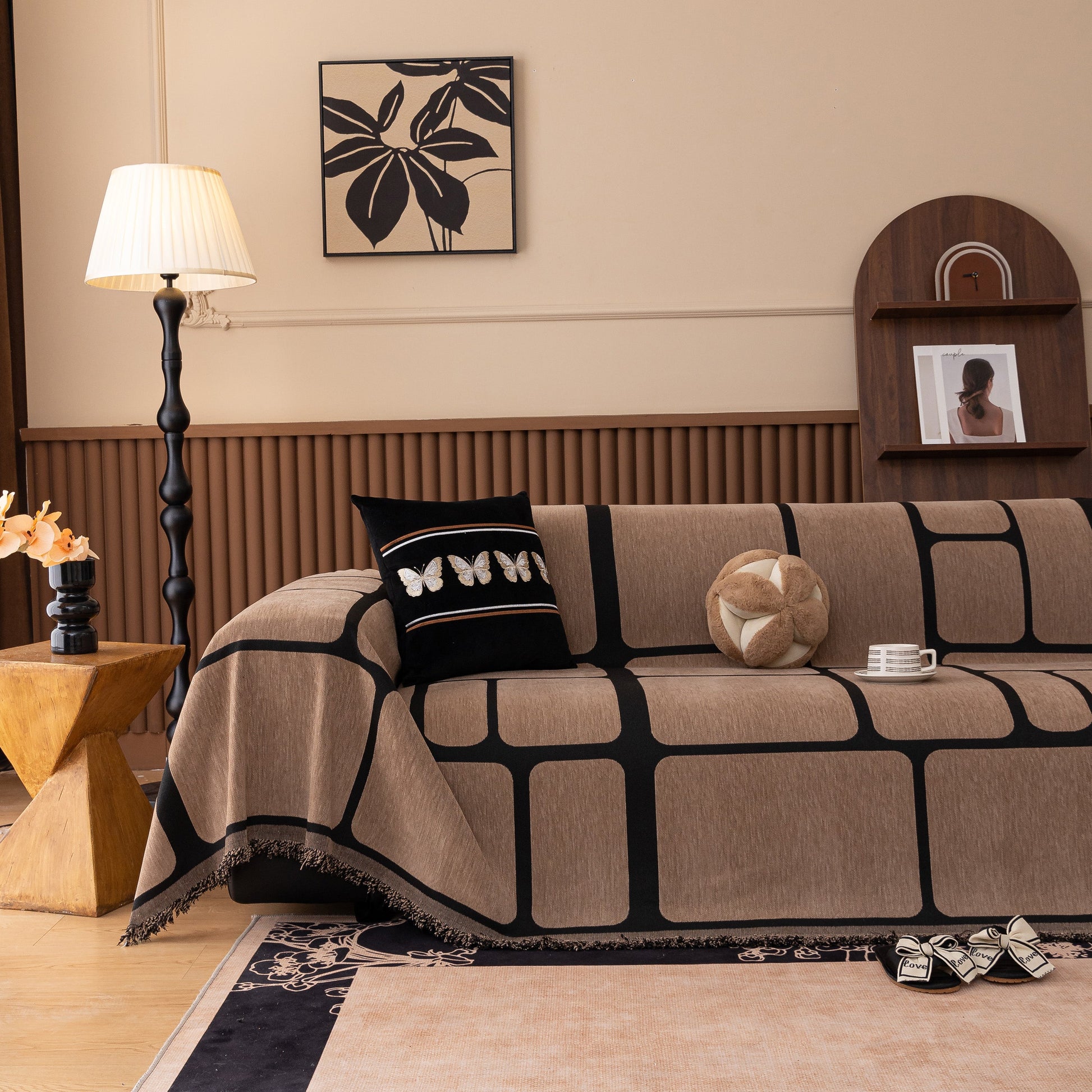Modern Geometric Sofa Cover Decorative Couch Throw Blanket Furniture Protector in a stylish living room setting with tassel edges.