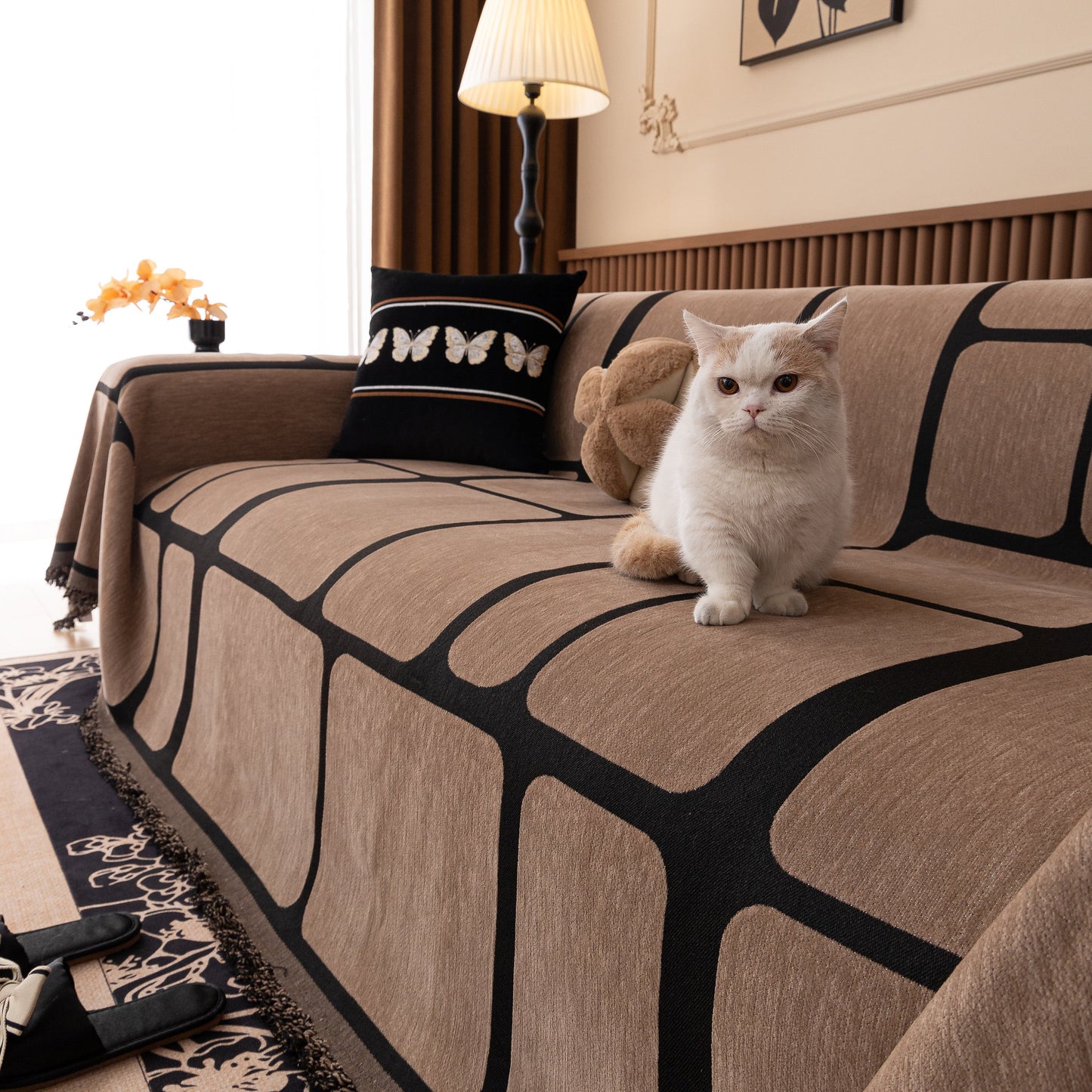 Modern Geometric Sofa Cover Decorative Couch Throw Blanket Furniture Protector with cat on a couch in a cozy living room
